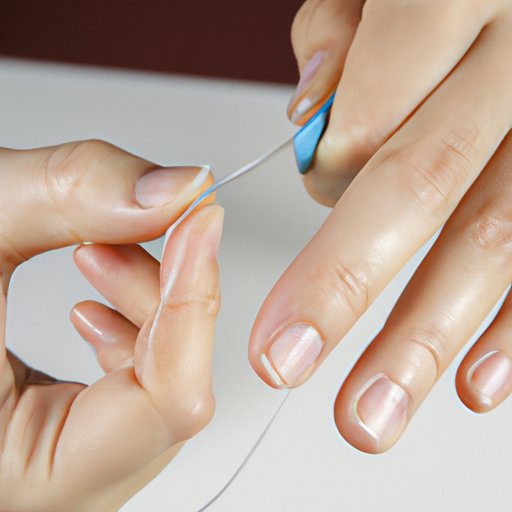 Using Dental Floss or a Cuticle Pusher to Safely Remove Acrylic Nails Without Damaging Your Natural Nails